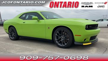 2023 Dodge Challenger R/T Scat Pack in a Sublime Metallic Clear Coat exterior color and Blackinterior. Ontario Auto Center ontarioautocenter.com 