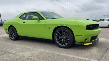 2023 Dodge Challenger R/T Scat Pack in a Sublime Metallic Clear Coat exterior color and Blackinterior. Ontario Auto Center ontarioautocenter.com 