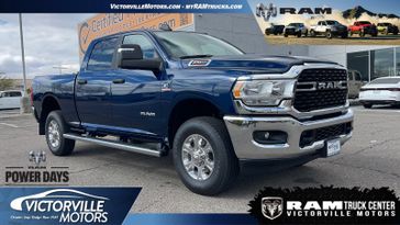 2024 RAM 2500 Big Horn Crew Cab 4x4 6'4' Box in a Patriot Blue Pearl Coat exterior color. Victorville Motors Chrysler Jeep Dodge RAM Fiat 760-513-6916 victorvillemotors.com 