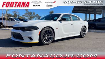 2023 Dodge Charger Scat Pack in a White Knuckle exterior color and Blackinterior. Fontana Chrysler Dodge Jeep RAM (909) 675-1186 fontanacdjr.com 