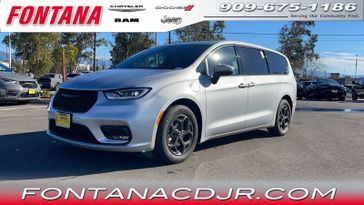 2023 Chrysler Pacifica Plug-in Hybrid Touring L in a Silver Mist Clear Coat exterior color and Blackinterior. Fontana Chrysler Dodge Jeep RAM (909) 675-1186 fontanacdjr.com 