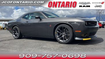 2023 Dodge Challenger R/T Scat Pack in a Granite Pearl Coat exterior color and Blackinterior. Jeep Chrysler Dodge RAM FIAT of Ontario 909-757-0698 jcofontario.com 