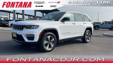2024 Jeep Grand Cherokee 4xe in a Bright White Clear Coat exterior color and Global Blackinterior. Fontana Chrysler Dodge Jeep RAM (909) 675-1186 fontanacdjr.com 