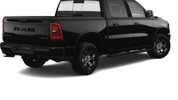 2025 RAM 1500 Big Horn Crew Cab 4x4 5'7' Box in a Diamond Black Crystal Pearl Coat exterior color. Wilmington Auto Center Chrysler Dodge Jeep Ram (937) 556-6430 wilmingtonautocentercdjr.com 