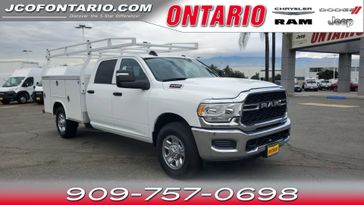 2023 RAM 2500 Tradesman in a Bright White Clear Coat exterior color and Blackinterior. Ontario Auto Center ontarioautocenter.com 