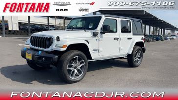 2024 Jeep Wrangler  Sport S 4xe in a Bright White Clear Coat exterior color and Blackinterior. Fontana Chrysler Dodge Jeep RAM (909) 675-1186 fontanacdjr.com 