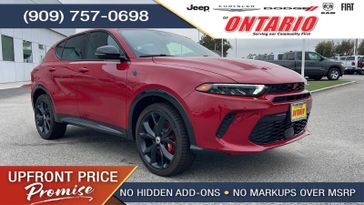 2024 Dodge Hornet R/T in a Hot Tamale exterior color and Blackinterior. Ontario Auto Center ontarioautocenter.com 