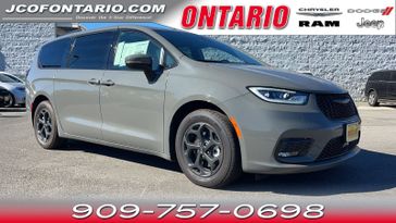 2023 Chrysler Pacifica Plug-in Hybrid Touring L in a Ceramic Gray Clear Coat exterior color and Blackinterior. Jeep Chrysler Dodge RAM FIAT of Ontario 909-757-0698 jcofontario.com 