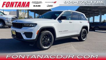 2024 Jeep Grand Cherokee Altitude 4x4 in a Bright White Clear Coat exterior color and Global Blackinterior. Fontana Chrysler Dodge Jeep RAM (909) 675-1186 fontanacdjr.com 