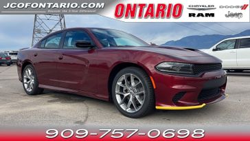 2023 Dodge Charger GT in a Octane Red Pearl Coat exterior color and Blackinterior. Ontario Auto Center ontarioautocenter.com 