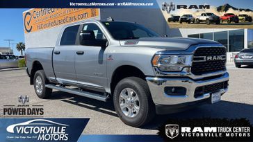 2024 RAM 2500 Big Horn Crew Cab 4x4 6'4' Box in a Billet Silver Metallic Clear Coat exterior color. Victorville Motors Chrysler Jeep Dodge RAM Fiat 760-513-6916 victorvillemotors.com 