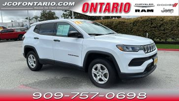 2022 Jeep Compass Sport in a Bright White Clear Coat exterior color and Blackinterior. Jeep Chrysler Dodge RAM FIAT of Ontario 909-757-0698 jcofontario.com 
