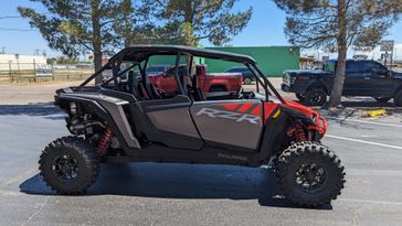 2024 POLARIS RZR XP 4 1000 ULTIMATE  INDY RED in a RED exterior color. Family PowerSports (877) 886-1997 familypowersports.com 