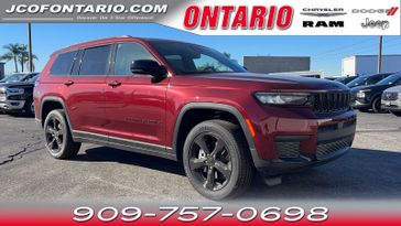 2023 Jeep Grand Cherokee L Altitude 4x2 in a Velvet Red Pearl Coat exterior color and Global Blackinterior. Jeep Chrysler Dodge RAM FIAT of Ontario 909-757-0698 jcofontario.com 