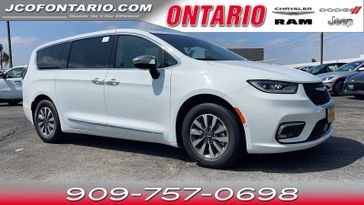 2023 Chrysler Pacifica Hybrid Limited in a Bright White Clear Coat exterior color and Black/Alloy/Blackinterior. Ontario Auto Center ontarioautocenter.com 