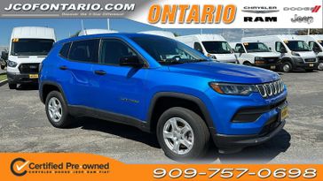 2022 Jeep Compass Sport in a Laser Blue Pearl Coat exterior color and Blackinterior. Jeep Chrysler Dodge RAM FIAT of Ontario 909-757-0698 jcofontario.com 