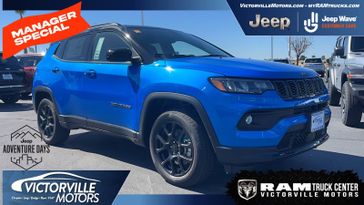 2024 Jeep Compass Latitude 4x4 in a Laser Blue Pearl Coat exterior color. Victorville Motors Chrysler Jeep Dodge RAM Fiat 760-513-6916 victorvillemotors.com 