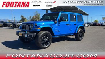 2024 Jeep Wrangler  Sahara 4xe in a Hydro Blue Pearl Coat exterior color and Blackinterior. Fontana Chrysler Dodge Jeep RAM (909) 675-1186 fontanacdjr.com 