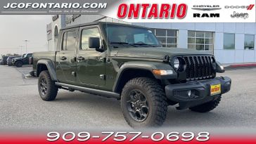 2023 Jeep Gladiator Willys 4x4 in a Sarge Green Clear Coat exterior color and Blackinterior. Jeep Chrysler Dodge RAM FIAT of Ontario 909-757-0698 jcofontario.com 