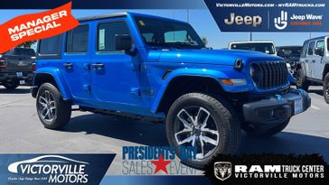 2024 Jeep Wrangler  Sport S 4xe in a Hydro Blue Pearl Coat exterior color and Blackinterior. Victorville Motors Chrysler Jeep Dodge RAM Fiat 760-513-6916 victorvillemotors.com 