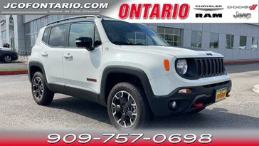 2023 Jeep Renegade Trailhawk in a Alpine White Clear Coat exterior color and Blackinterior. Jeep Chrysler Dodge RAM FIAT of Ontario 909-757-0698 jcofontario.com 