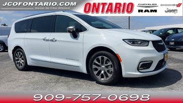 2023 Chrysler Pacifica Plug-in Hybrid Pinnacle in a Bright White Clear Coat exterior color and Caramel/Blackinterior. Jeep Chrysler Dodge RAM FIAT of Ontario 909-757-0698 jcofontario.com 