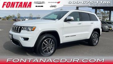 2021 Jeep Grand Cherokee Limited in a Bright White Clear Coat exterior color and Blackinterior. Fontana Chrysler Dodge Jeep RAM (909) 675-1186 fontanacdjr.com 