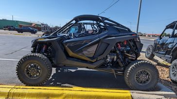 2023 POLARIS RZR PRO R ULTIMATE  STEALTH BLACK in a BLACK exterior color. Family PowerSports (877) 886-1997 familypowersports.com 