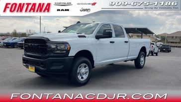 2024 RAM 3500 Tradesman in a Bright White Clear Coat exterior color and Diesel Gray/Blackinterior. Fontana Chrysler Dodge Jeep RAM (909) 675-1186 fontanacdjr.com 