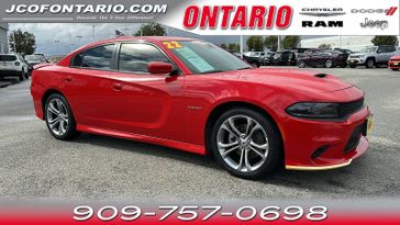 2022 Dodge Charger R/T in a Torred Clear Coat exterior color and Blackinterior. Jeep Chrysler Dodge RAM FIAT of Ontario 909-757-0698 jcofontario.com 