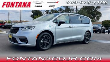 2023 Chrysler Pacifica Plug-in Hybrid Touring L in a Silver Mist Clear Coat exterior color and Blackinterior. Fontana Chrysler Dodge Jeep RAM (909) 675-1186 fontanacdjr.com 