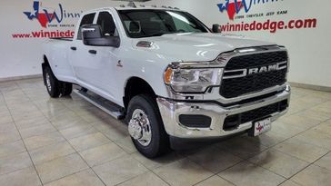 2024 RAM 3500 Tradesman in a Bright White Clear Coat exterior color and Blackinterior. Wnnie Dodge 000-000-0000 pixelmotiondemo.com 