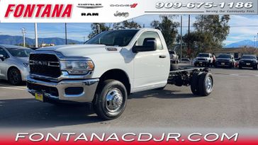 2024 RAM 3500 Chassis Cab Tradesman in a Bright White Clear Coat exterior color and Diesel Gray/Blackinterior. Fontana Chrysler Dodge Jeep RAM (909) 675-1186 fontanacdjr.com 