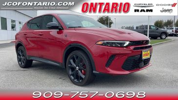 2024 Dodge Hornet R/T in a Hot Tamale exterior color and Blackinterior. Ontario Auto Center ontarioautocenter.com 