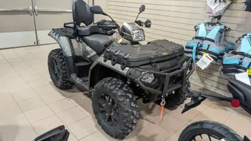 2024 POLARIS SPORTSMAN TOURING XP 1000 TRAIL HEAVY METAL in a HEAVY METAL exterior color. Family PowerSports (877) 886-1997 familypowersports.com 