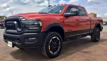2024 RAM 2500 Rebel Crew Cab 4x4 6'4' Box in a Flame Red Clear Coat exterior color and Blackinterior. Matthews Chrysler Dodge Jeep Ram 918-276-8729 cyclespecialties.com 