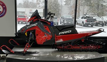 2024 Polaris PRO-RMK Slash 155 in a Indy Red/Stealth Gray exterior color. Plaistow Powersports (603) 819-4400 plaistowpowersports.com 