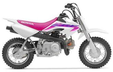 2023 Honda CRF 50F in a White exterior color. New England Powersports 978 338-8990 pixelmotiondemo.com 