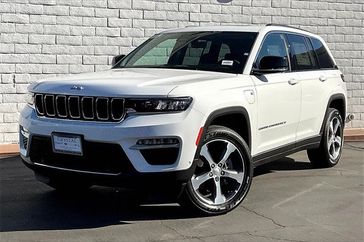 2024 Jeep Grand Cherokee 4xe in a Bright White Clear Coat exterior color and Global Blackinterior. Crystal Chrysler Jeep Dodge Ram (760) 507-2975 pixelmotiondemo.com 