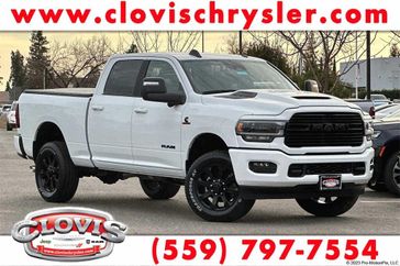 2024 RAM 2500 Laramie Crew Cab 4x4 6'4' Box in a Bright White Clear Coat exterior color and Blackinterior. Clovis Chrysler Dodge Jeep RAM 559-314-1399 clovischryslerdodgejeepram.com 