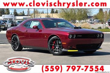 2023 Dodge Challenger R/T Scat Pack in a Octane Red exterior color and Blackinterior. Clovis Chrysler Dodge Jeep RAM 559-314-1399 clovischryslerdodgejeepram.com 