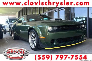 2023 Dodge Challenger Scat Pack Swinger in a F8 Green exterior color. Clovis Chrysler Dodge Jeep RAM 559-314-1399 clovischryslerdodgejeepram.com 