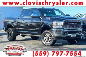 2022 RAM 2500 Limited in a Diamond Black Crystal Pearl Coat exterior color and Blackinterior. Clovis Chrysler Dodge Jeep RAM 559-314-1399 clovischryslerdodgejeepram.com 