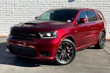 2018 Dodge Durango SRT in a Octane Red Pearl Coat exterior color and Blackinterior. Crystal Chrysler Jeep Dodge Ram (760) 507-2975 pixelmotiondemo.com 