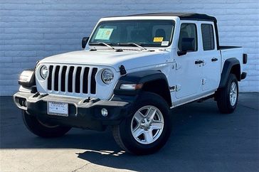 2020 Jeep Gladiator Sport in a Bright White Clear Coat exterior color and Blackinterior. I-10 Chrysler Dodge Jeep Ram (760) 565-5160 pixelmotiondemo.com 