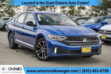 2024 Volkswagen Jetta 1.5T Sport in a Rising Blue Metallic exterior color and Titan Blackinterior. Ontario Auto Center ontarioautocenter.com 