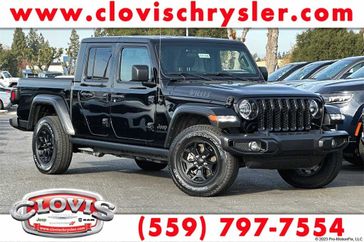2022 Jeep Gladiator Sport in a Black Clear Coat exterior color and Blackinterior. Clovis Chrysler Dodge Jeep RAM 559-314-1399 clovischryslerdodgejeepram.com 