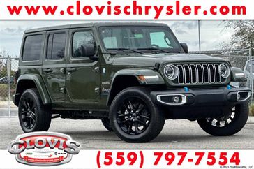 2024 Jeep Wrangler 4-door Sahara 4xe in a Sarge Green Clear Coat exterior color. Clovis Chrysler Dodge Jeep RAM 559-314-1399 clovischryslerdodgejeepram.com 