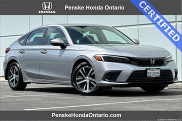 2024 Honda Civic LX in a Lunar Silver Metallic exterior color and Blackinterior. Ontario Auto Center ontarioautocenter.com 