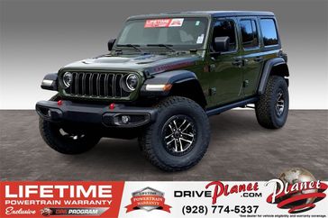 2024 Jeep Wrangler 4-door Rubicon in a Sarge Green Clear Coat exterior color. Planet Chrysler Dodge Jeep Ram FIAT of Flagstaff (928) 569-5797 planetchryslerdodgejeepram.com 